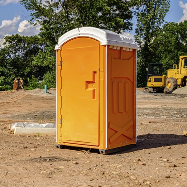 what is the cost difference between standard and deluxe portable restroom rentals in Eunice